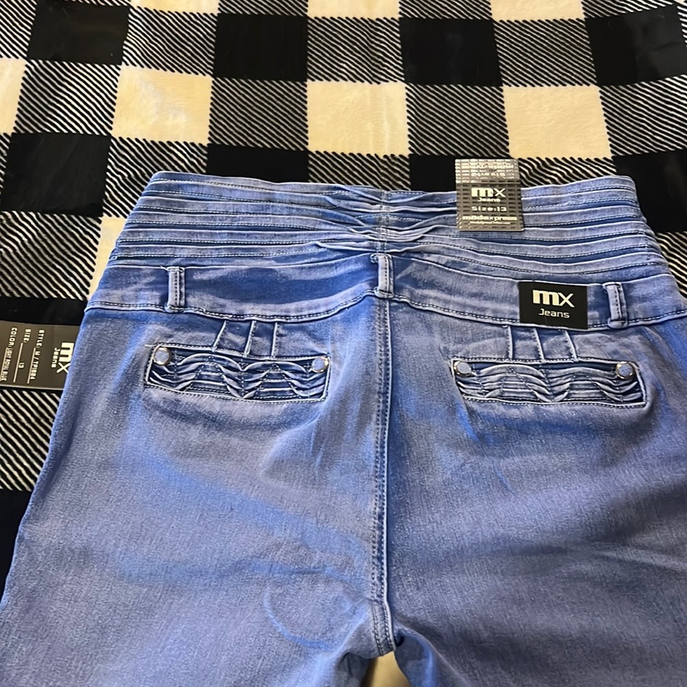 ModaXpress new with tags. Stretchy comfortable lightweight jeans/jeggings.